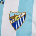 Malaga Home Kids Football Kit 2025_26-detail1