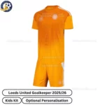 Leeds United Goalkeeper Kids Football Kit 2025_26 (No Socks) – Orange-front view-blur