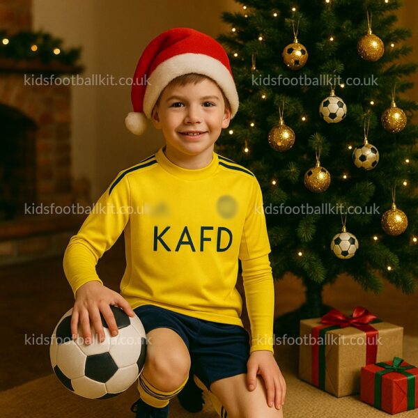 Al Nassr Christmas Gift Bundle – Home Kids Football Kit 2025_26 (With socks & Base Layer Top) – RONALDO 7