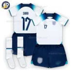 England-Home-Stadium-Kids-Football-Kit-2022_23-–-SAKA-17-With-Socks-blur-r