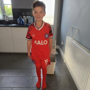 Child's football kit photo shared by a family