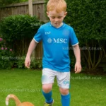 SSC-Napoli-McTOMINAY-8-Home-Kids-Football-Kit-2024_25-No-Socks_anonymized