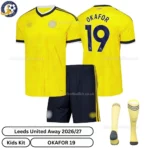 Leeds United Away Kids Kit 26_27-over view with socks-OKAFOR 19