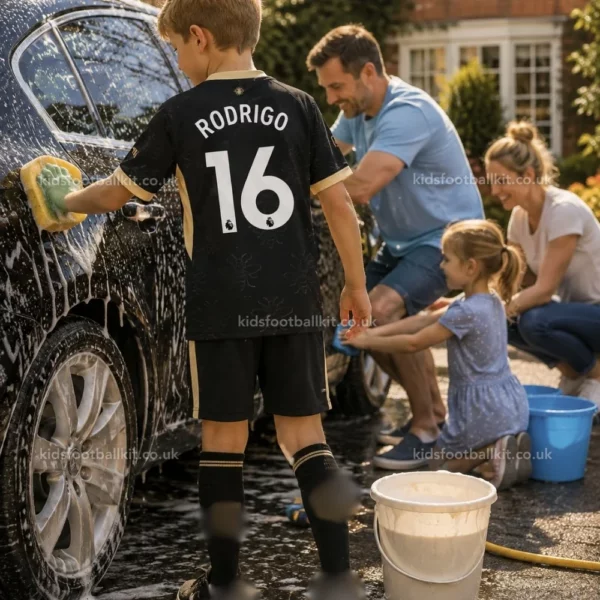 Manchester City Away Kids Kit 26_27-over view-RODRIGO 16-image